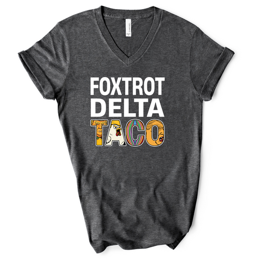 Charcoal gray v-neck t-shirt with bold white text that reads "Foxtrot Delta TACO," featuring colorful illustrated letters on the word "TACO."